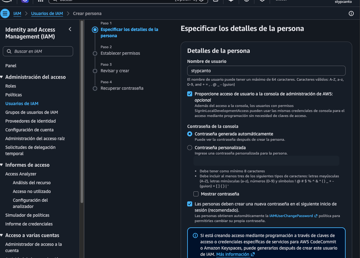 Paso 1 "Especificar los detalles de la persona": nombre de usuario stypcanto, checkbox "Proporcione acceso de usuario a la consola de administración de AWS" marcado, contraseña generada automáticamente, checkbox "Las personas deben crear una nueva contraseña en el siguiente inicio de sesión" marcado