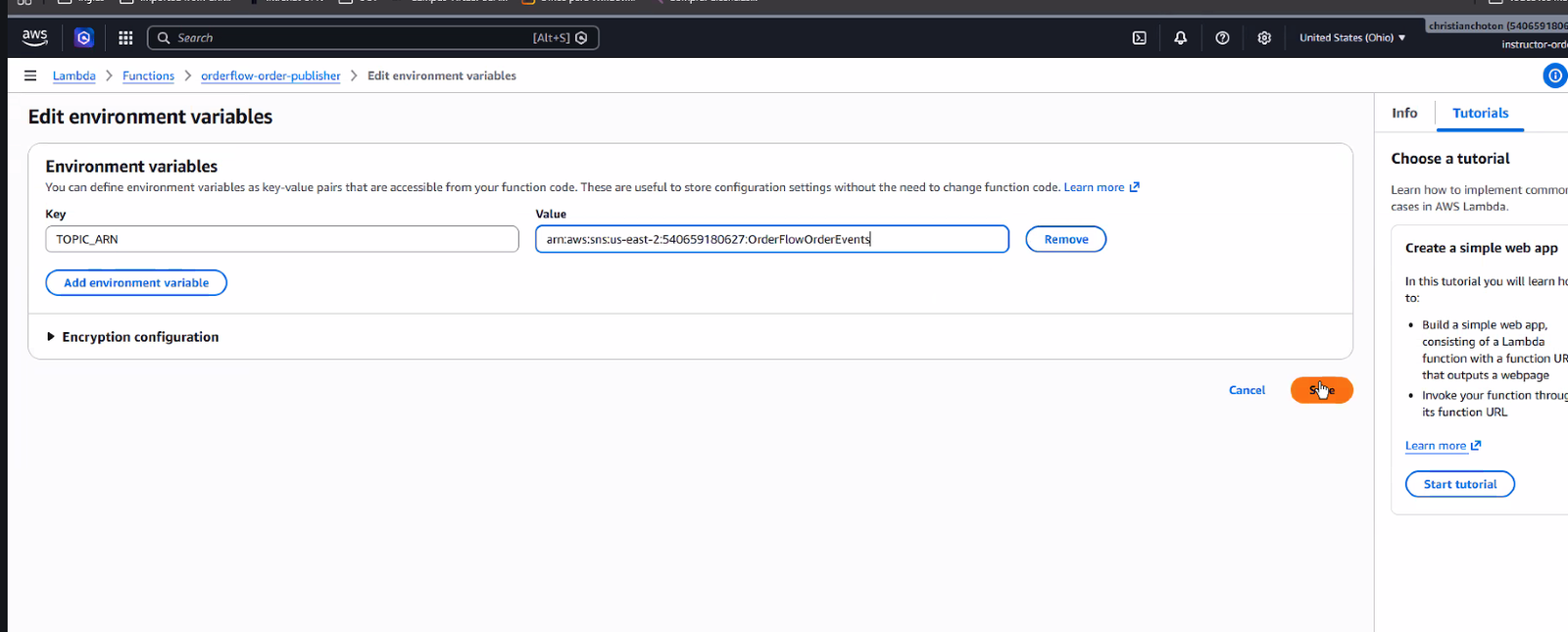 Formulario "Edit environment variables" de la Lambda orderflow-order-publisher, con Key "TOPIC_ARN" y Value "arn:aws:sns:us-east-2:540659180627:OrderFlowOrderEvents" pegado desde el ARN copiado de la consola de SNS