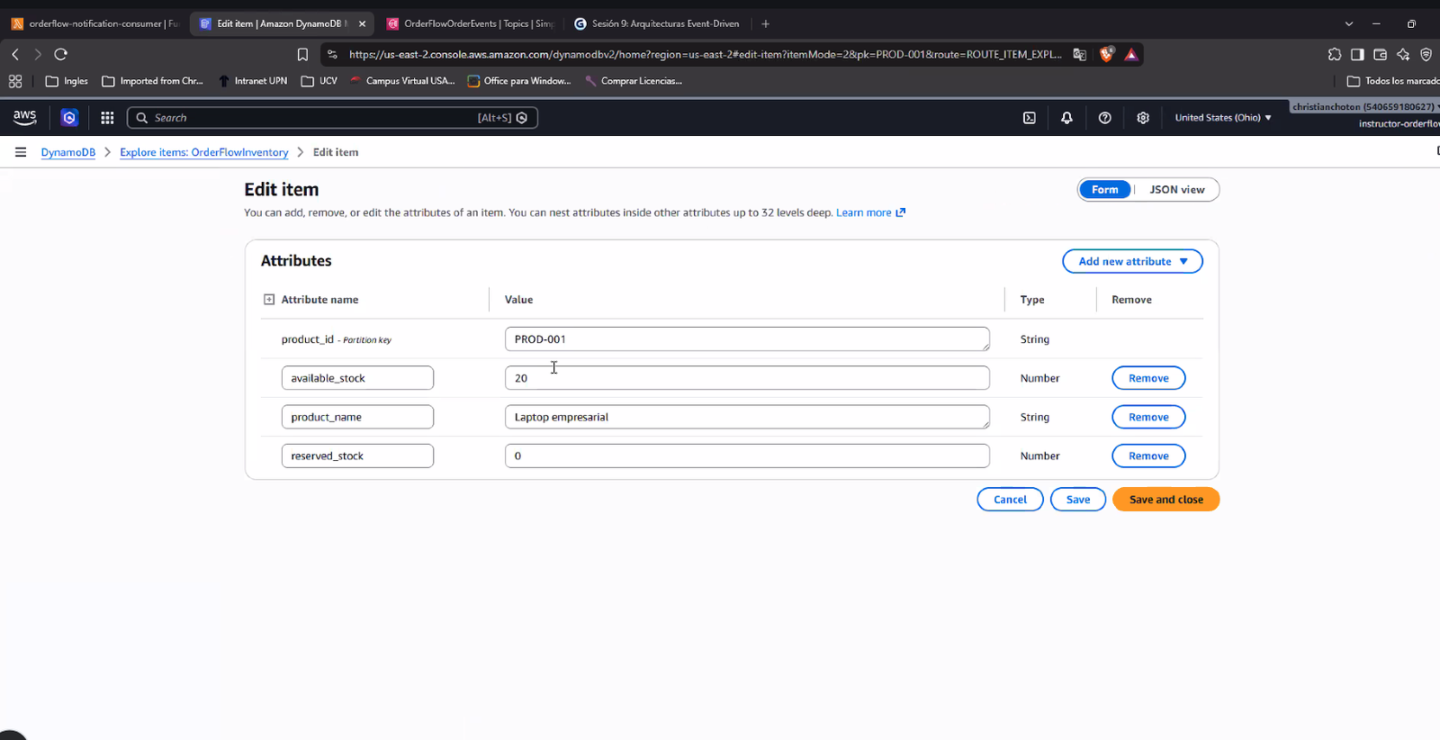 Página "Edit item" de DynamoDB para la tabla OrderFlowInventory, mostrando el ítem con partition key product_id "PROD-001" y los atributos available_stock (Number, 20), product_name (String, "Laptop empresarial") y reserved_stock (Number, 0)
